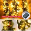 imageGoplus 9ft Snow Flocked Christmas Garland with 50 LED Lights PreLit Battery Operated Artificial Garland with White Berries ampamp Poinsettias Flowers Timer Snowy Holiday Decoration for Mantel IndoorGreen