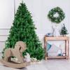 imageGoplus White Artificial Christmas Tree 6ft Premium Unlit Hinged Spruce Full Tree with 1000 Branch Tips and Metal Stand Easy Assembly for Indoor and Outdoor UseGreen