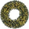 image:imageGoplus 60 Inch Large PreLit Christmas Wreath Lighted Artificial Winter Xmas Wreaths for Front Door with 200 LED Warm White Lights 680 PVC Branch Tips 24 Pine Cones for Windows Wall Mantel DecorGreen